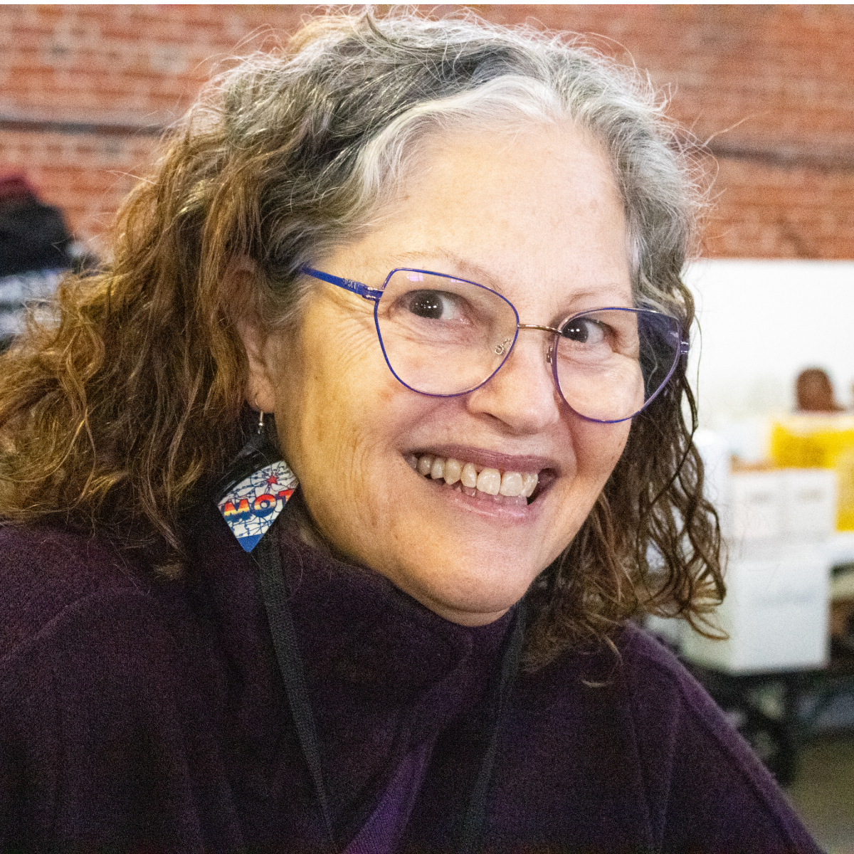 reVinyled collector wearing her earrings