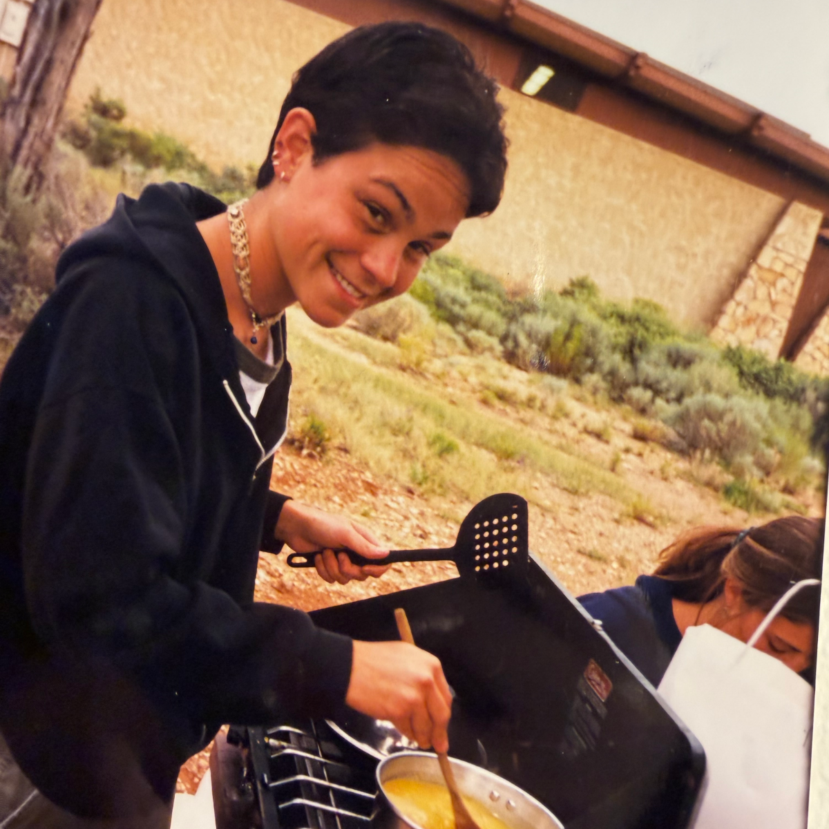Leah making hemp jewelry while traveling