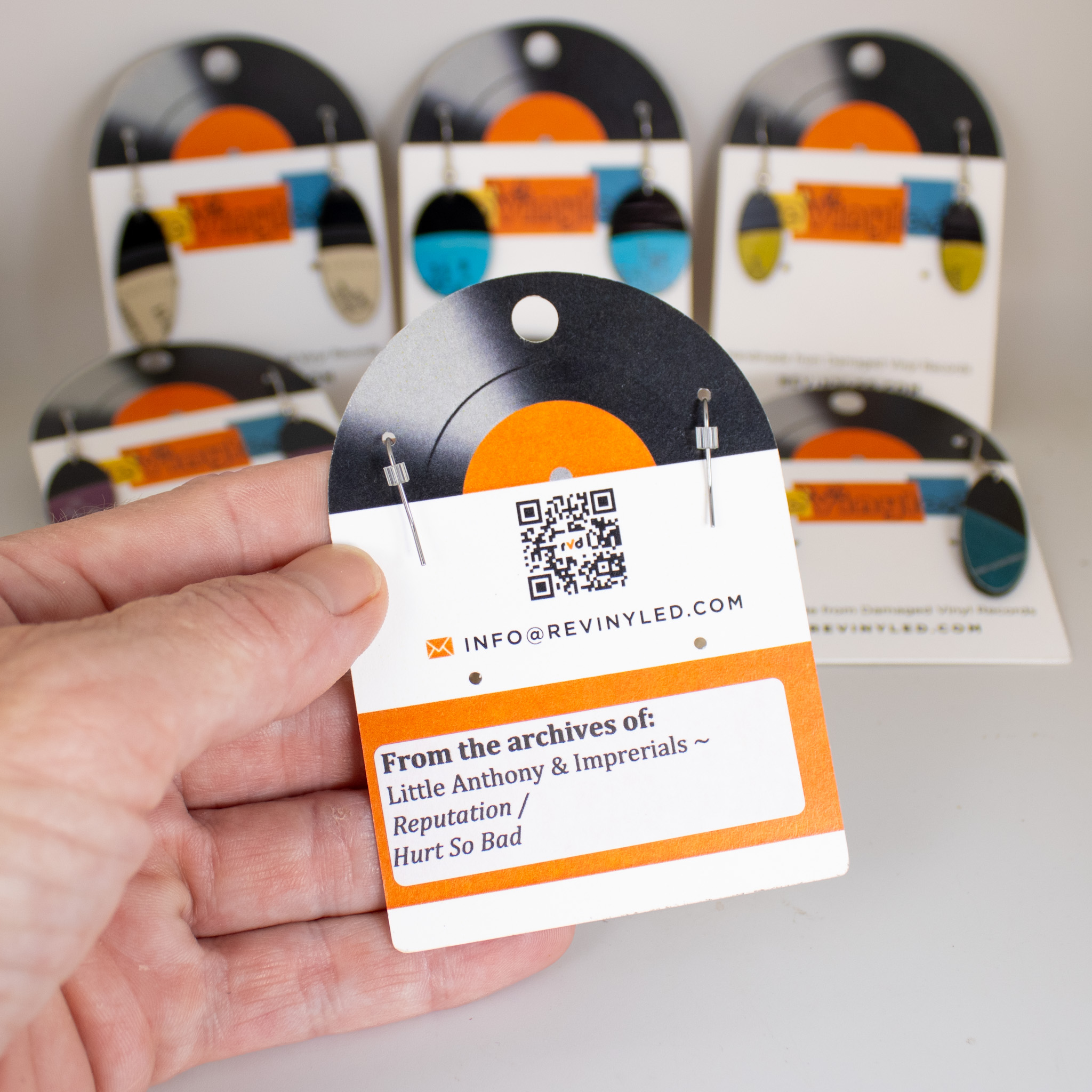 Back of a reVinyled earring card showing source record information