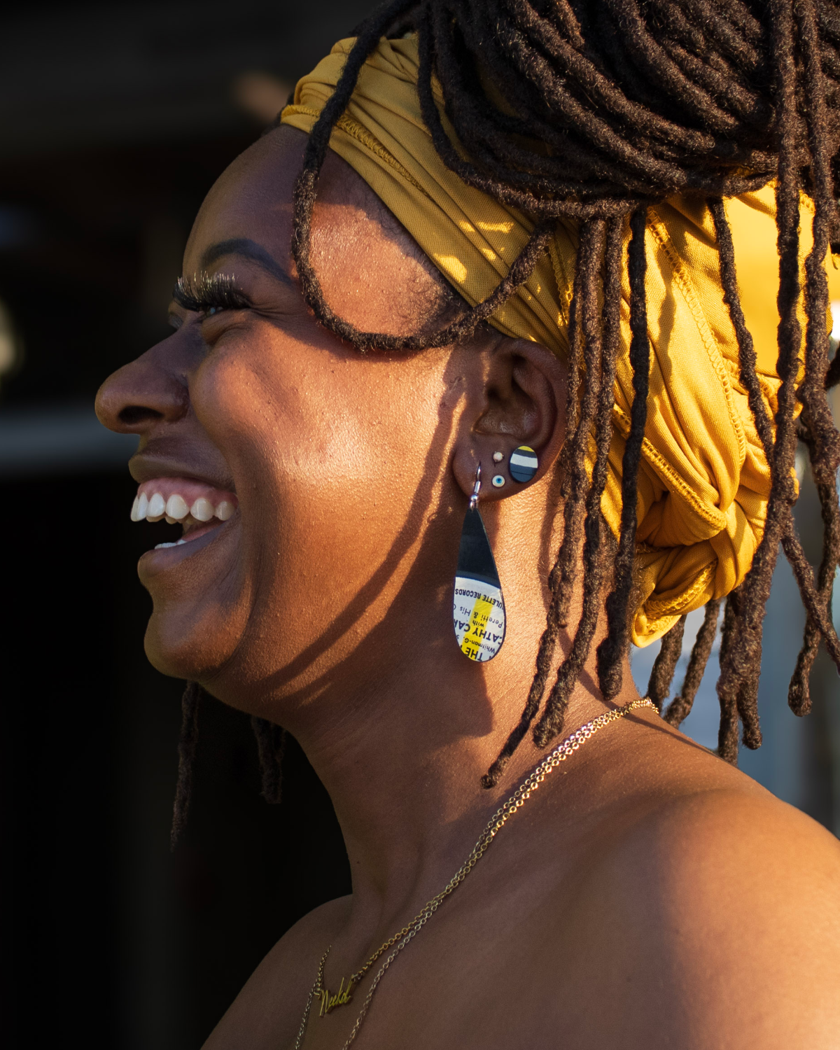 Woman wearing reVinyled earrings