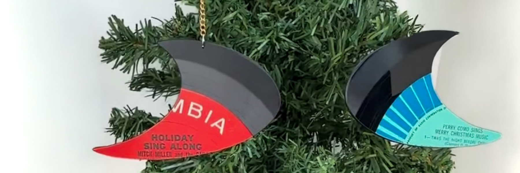 Handmade reVinyled Astro ornament cut from a rescued vinyl record