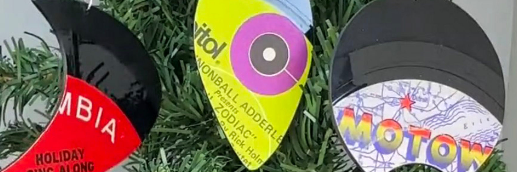 A collection of one-of-a-kind reVinyled vinyl record ornaments