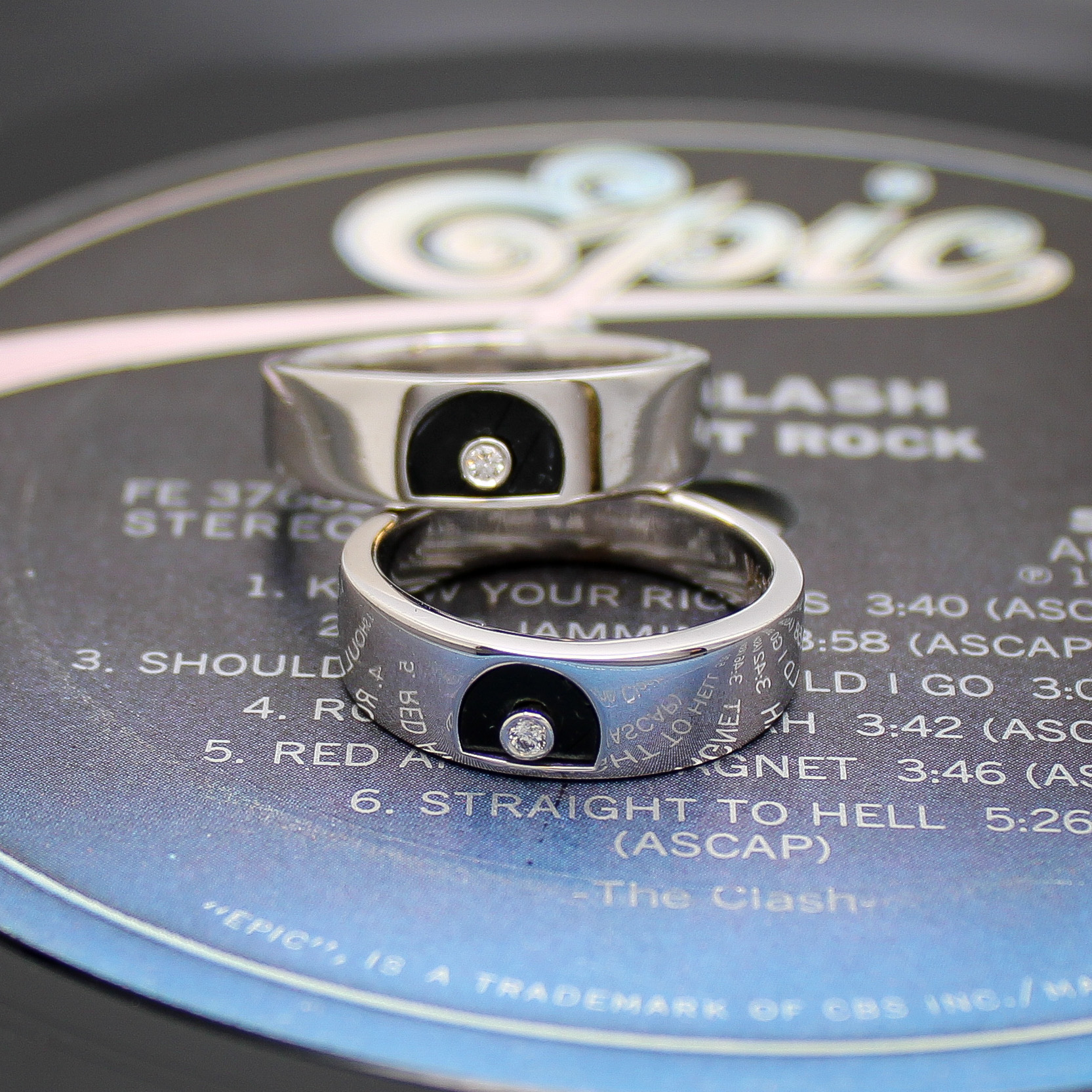 Custom wedding bands with vinyl record inlay by reVinyled