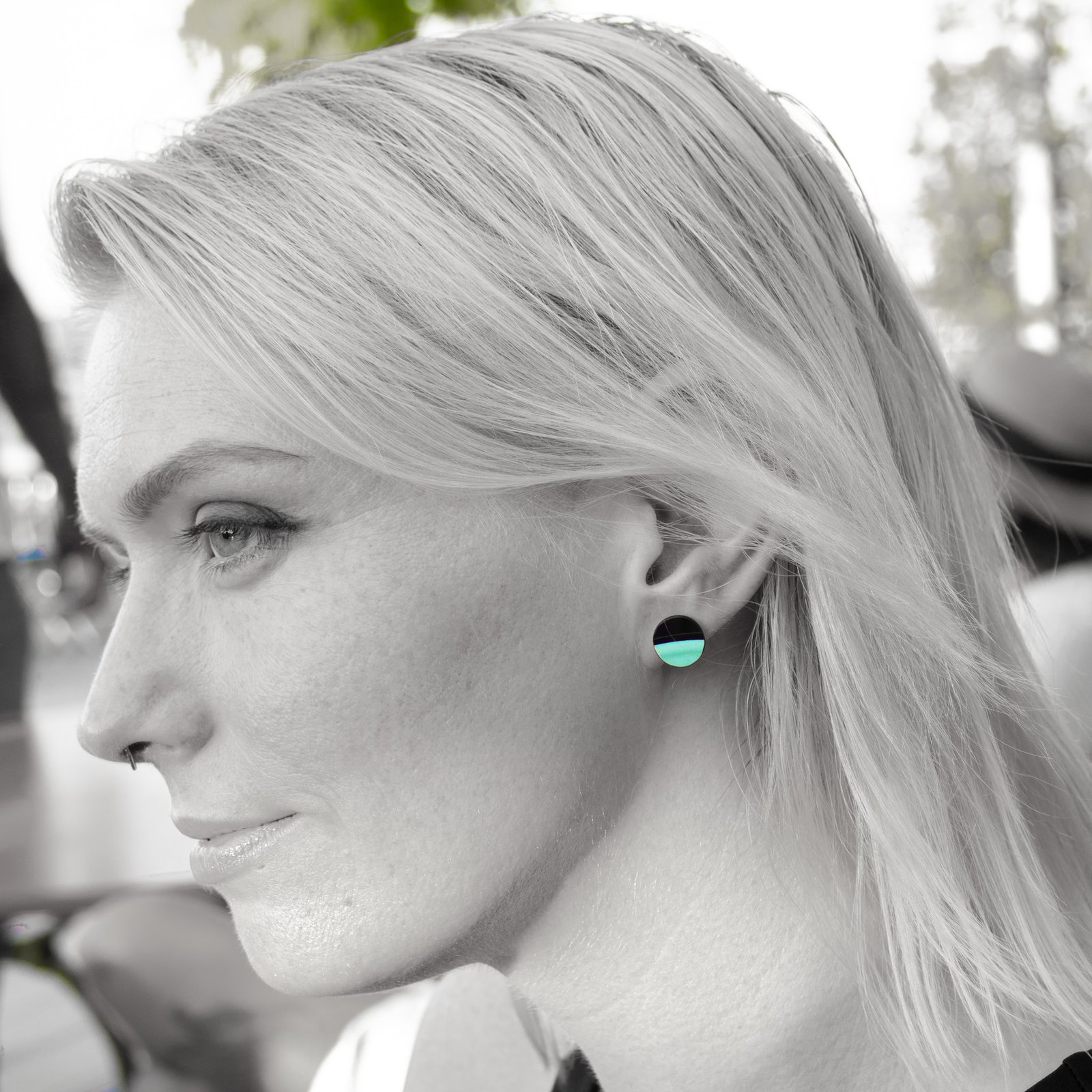Portrait wearing reVinyled earrings